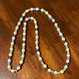 Elegant Beaded Necklace in Gold and Purple